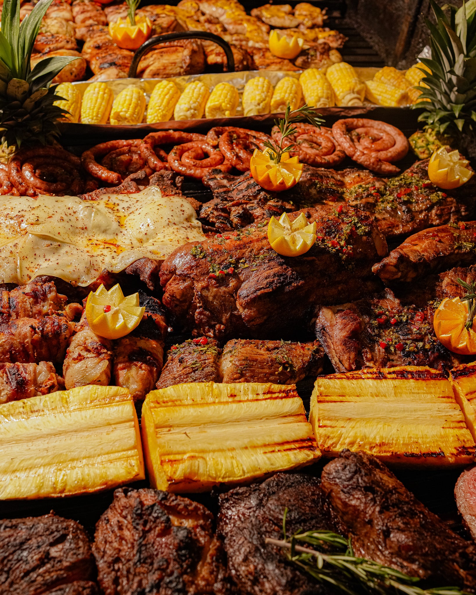 Grilled chicken and pork ribs on the parrilla at The Knife